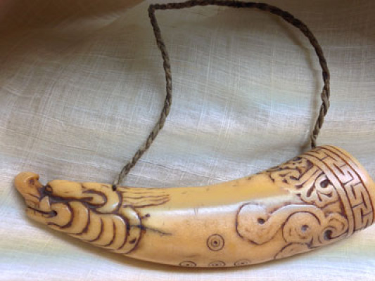 Tibetan 17th century makara powder horn