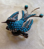19th century silver and gold, turquoise, pearl, swallow brooch